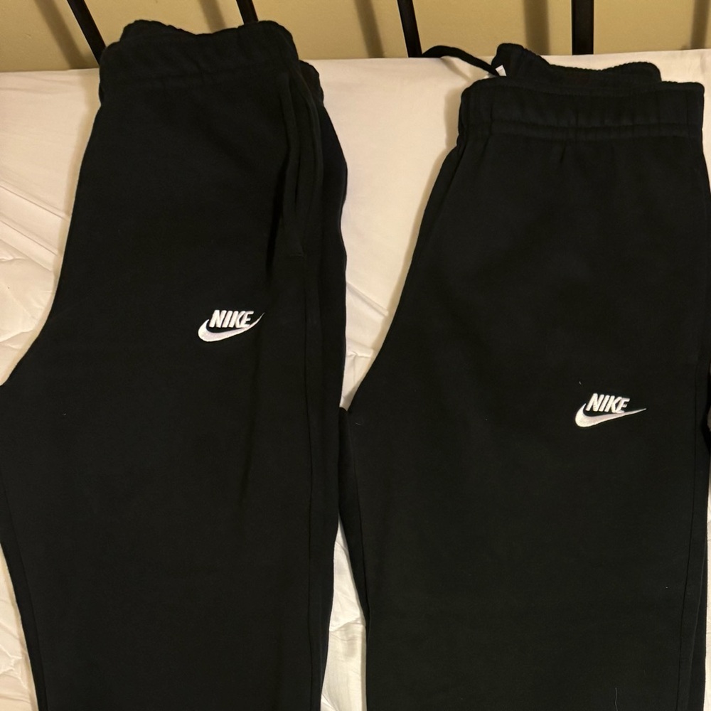 2 Pairs of Black Men’s Size XS NIKE sweatpantsts. $20 EACH